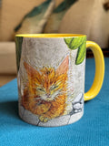 Ginger kitten coffee mug with yellow handle and interior