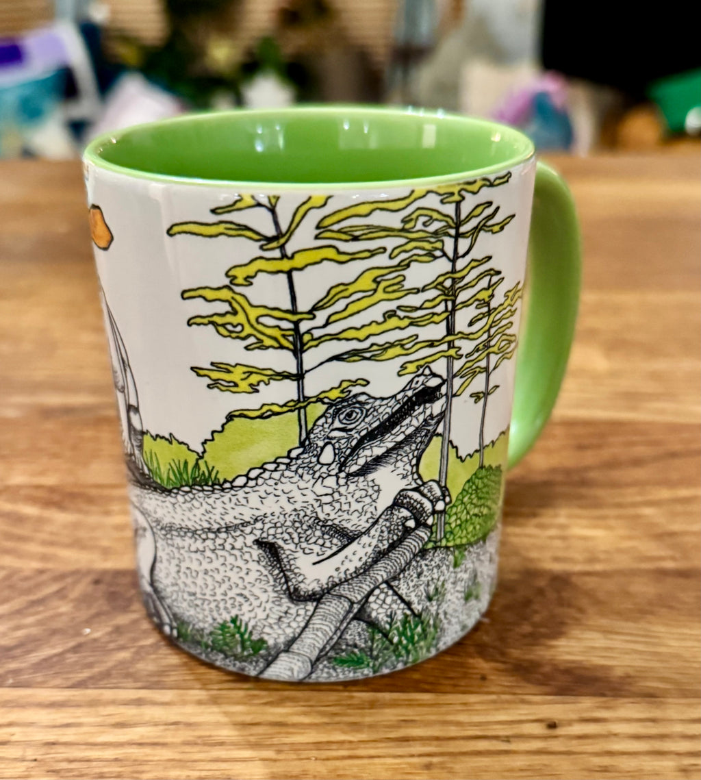 Green Crystal Palace dinosaur mug - iguanodons