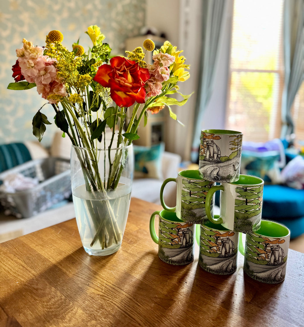 Green Crystal Palace dinosaur mug - iguanodons